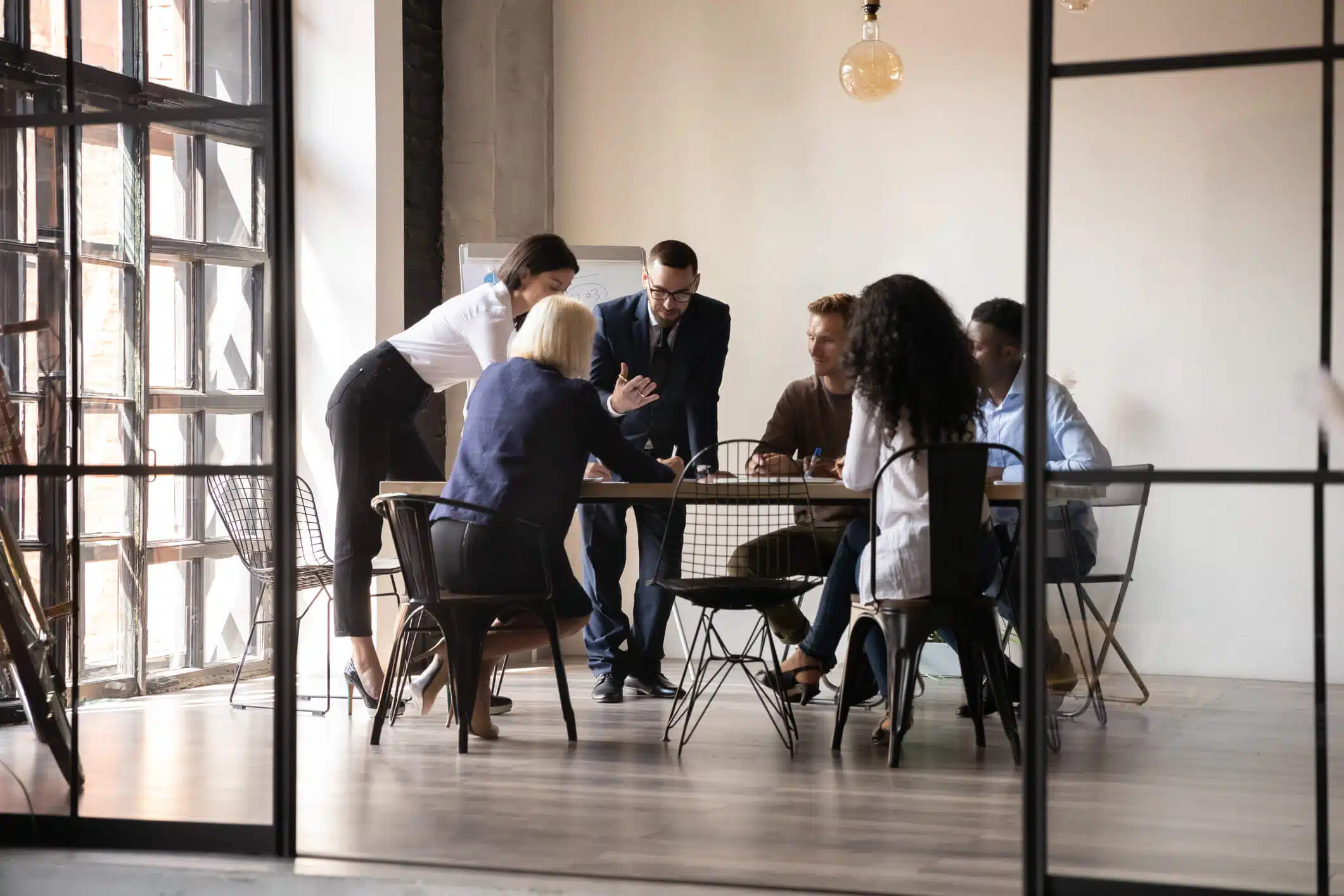 Non-equity partners meet to discuss law firm management strategy.