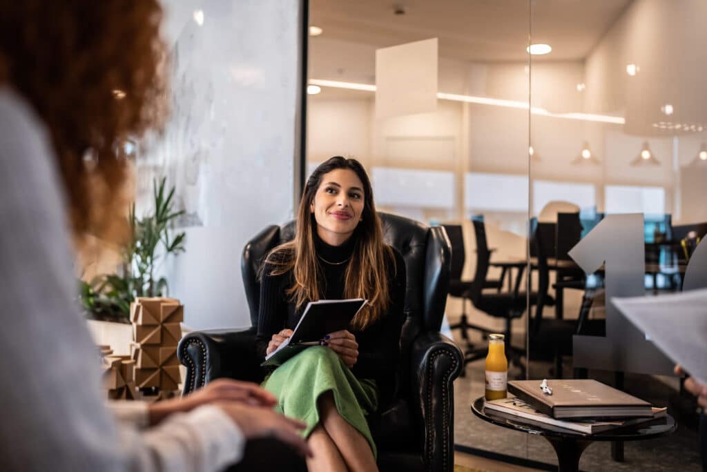 A law firm manager collects feedback from a team member before making business decisions.
